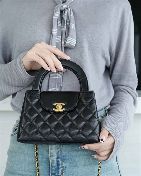 black chanel kelly bag|Chanel Kelly Bag price.